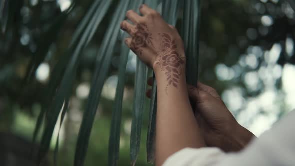 Woman with a Palm Leaves.