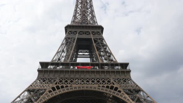 Magnificent  Eiffel tower  symbol of france and Paris slow tilt 4K 2160p 30fps UltraHD footage - Fre