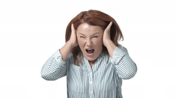 Stressed and Upset Redhead Adult Woman Have Panic Attack Hear Loud Annoying Awful Sound Shut Ears