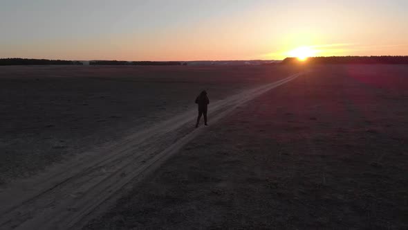 Running Man Silhouette in Sunset Time. Outdoor Cross-country Running