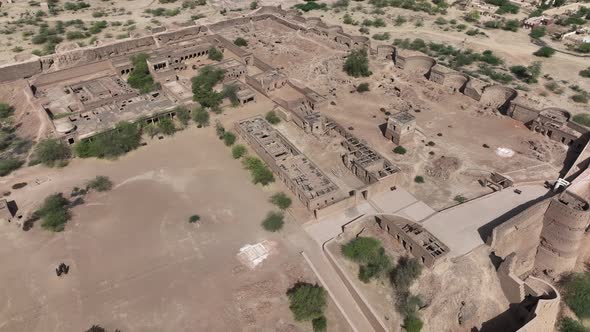 Aerial view of building and tree inside the Derawar fort