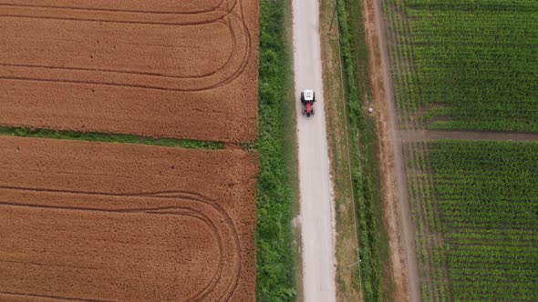 Tractor driving on a country road in Friuli Venezia Giulia, Italy