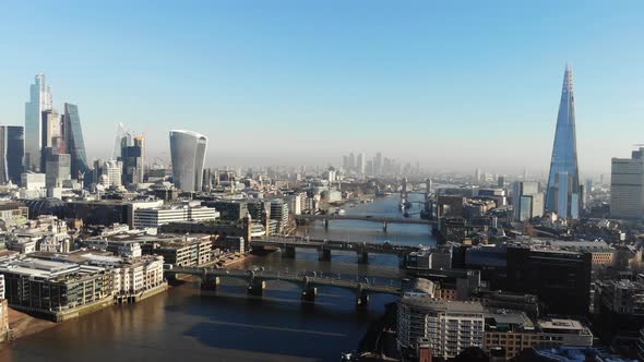 Aerial view of the Shard and London's tallest skyscrapers from financial District on a sunny day