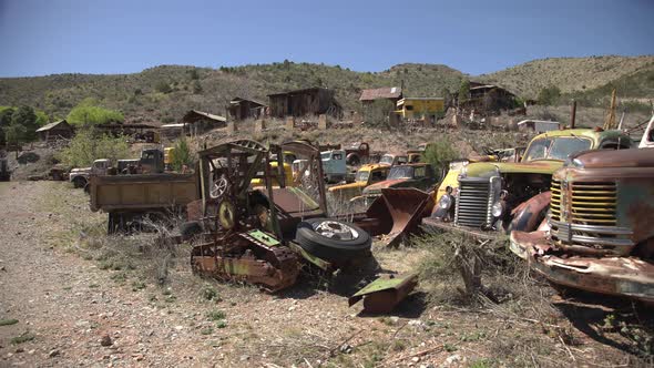 Old rusted trucks at the Ghost Town alt
