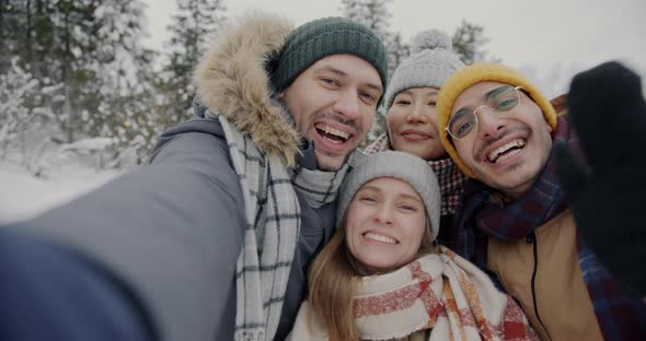 Slow Motion of Diverse Group of Tourists Taking Selfie Posing for Camera and Laughing in Beautiful