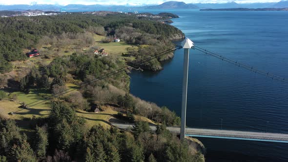 Tower of Bomlo suspension bridge before revealing full bridge view and Spissousundet fjord