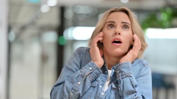 Scared Young Woman Looking Around Frightened