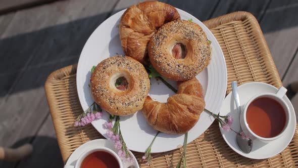 Breakfast On A Plate Bagels and Croissants with Tea