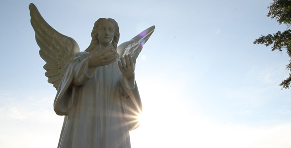 Angel Statue In Graveyard