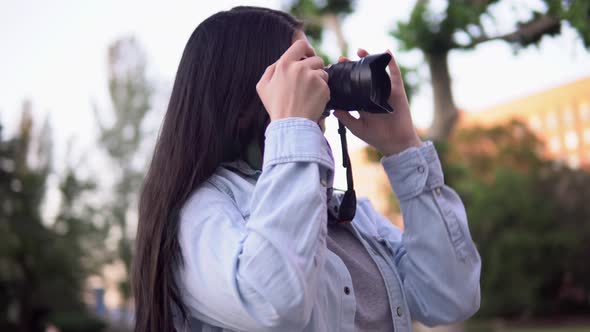 Woman Professional Photographer Working on Street Using Photo Camera Making Pic