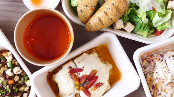 Woman Hand Take and Eating Low Calorie Lasagna By Wooden Spoon