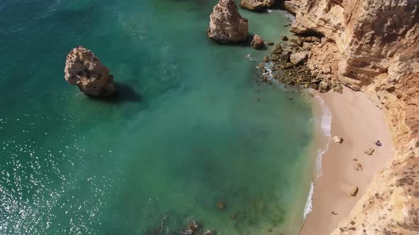 Flying over Praia Da Marinha (Marinha Beach) in Algarve, Portugal.