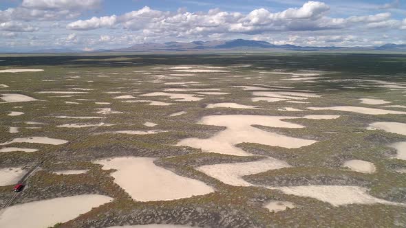 Wide aerial view of the Utah desert with sand traps