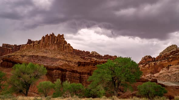 Timelapse of dramatic clouds moving over the cliffs in Capitol Reef