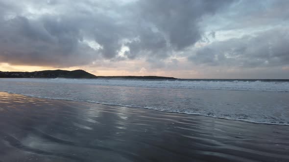 Dramatic Sunset and Waves at Narin Strand By Portnoo County Donegal in Ireland