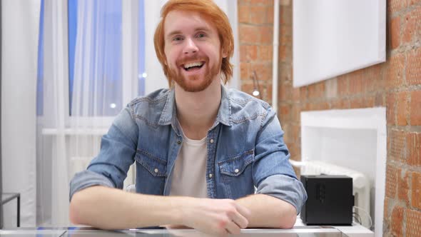 Redhead Beard Man Gesturing  Victory Sign