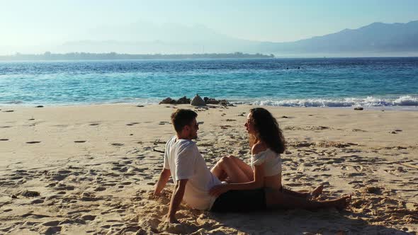 Beautiful Couple on Romantic Honeymoon Have Fun on Beach on Clean White Sand