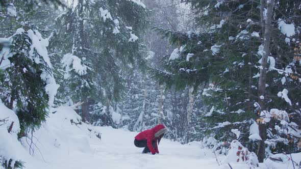 Girl playing with snow