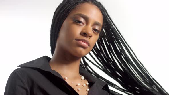 Mixed Race Woman with Hair Braids in Studio on White Closeup Portrait