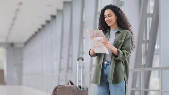 Alone Happy Young Hispanic Beautiful Vaccinated Woman Female Tourist Traveller Standing in Airport