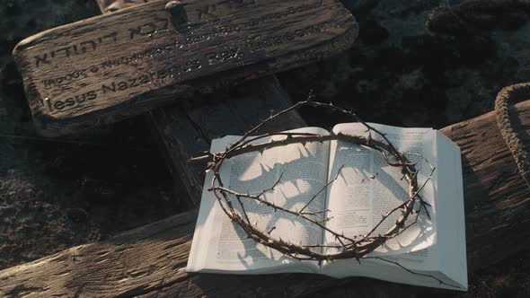 Bible and Crown of Thorns on Cross alt