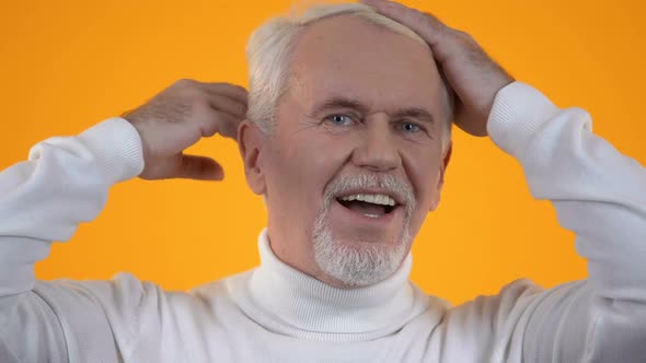 Handsome Elderly Male Admiring Appearance, Satisfied With Haircut, Body Care