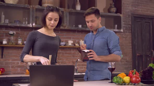 Busy Lady and Guy Eat Delivery Food