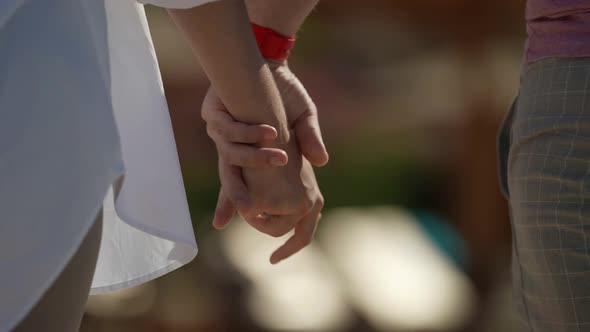 Closeup of Male and Female Hands