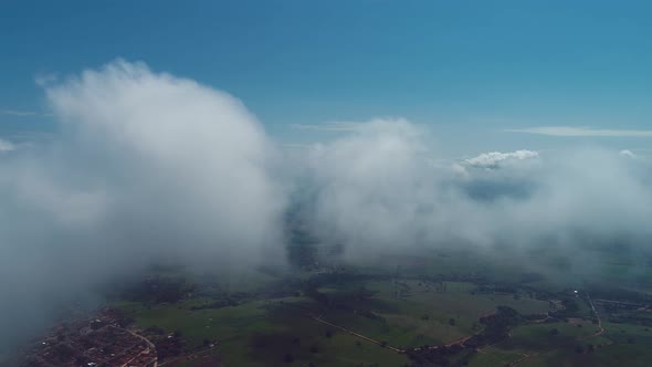 Fog morning at downtown district. Above the clouds.