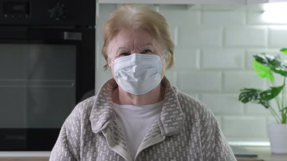 Video Portrait of Happy Senior Old Woman in Medical Mask During Quarantine Covid19 Pandemic Outbreak
