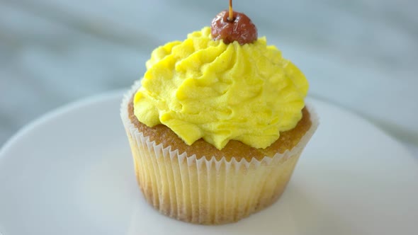 Cupcake with Delicious Yellow Cream