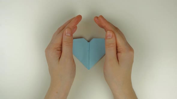 Love concept with origami hearts