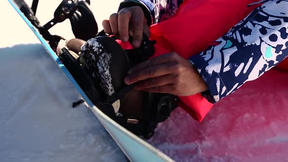 Snowboarder Preparing To Ride