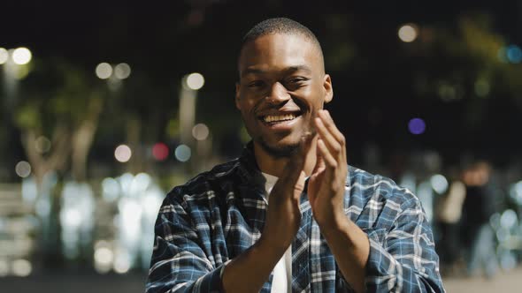 Portrait in Night City Evening Outdoors African American Friendly Successful Man Guy in Plaid Shirt