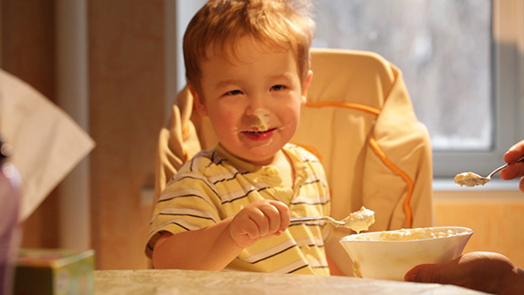 Little Boy Eats Porridge
