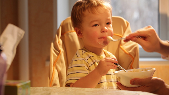 Little Boy Eats Porridge - Time Lapse
