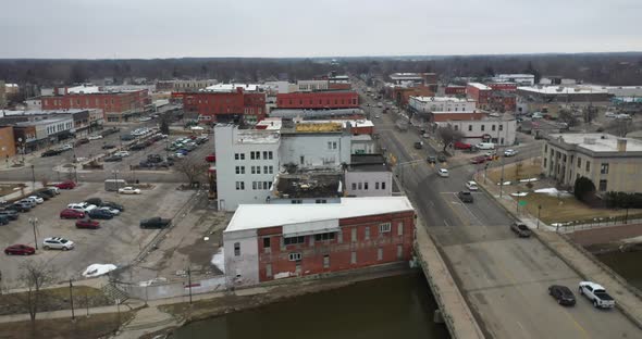 Owosso Michigan downtown skyline with drone videoing sideways.