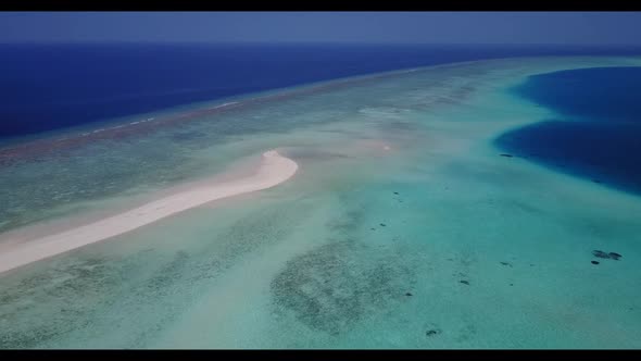 Aerial drone panorama of luxury island beach holiday by clear lagoon and clean sandy background of a