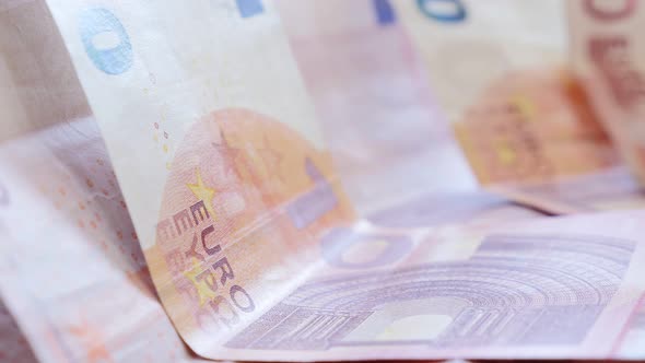 Euro money banknotes in the row 4K 2160p UltraHD slow panning footage - 10 Euro banknotes on table s