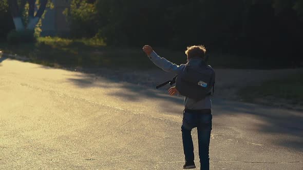 Schoolboy Runs Skipping Throws White Paper 2 Sheets After Exam