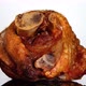 Roasted Bavarian Pork Knuckle on white background rotating close up. - VideoHive Item for Sale