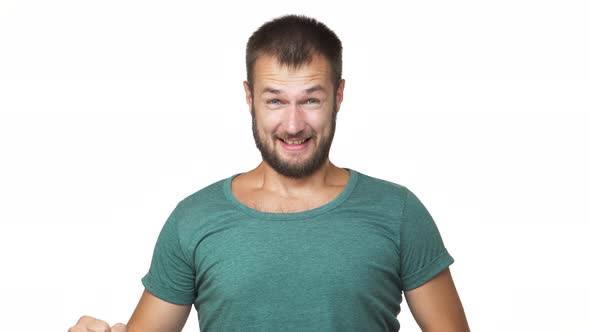 Headshot Portrait of Betting Lucky Man 30s Wearing Shirt Being Tense Happy Behaving Like Winner