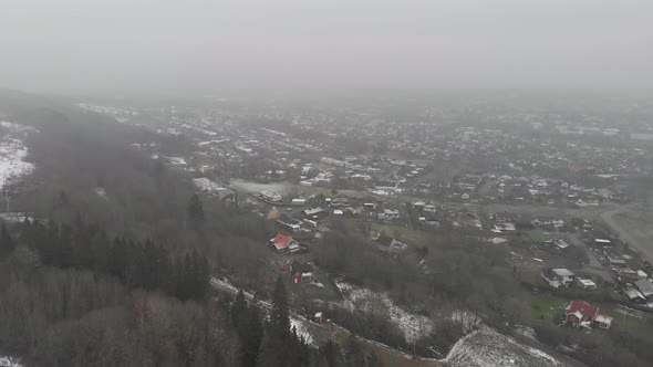 View of Vast Villa Neighborhood Next to Rural Forest