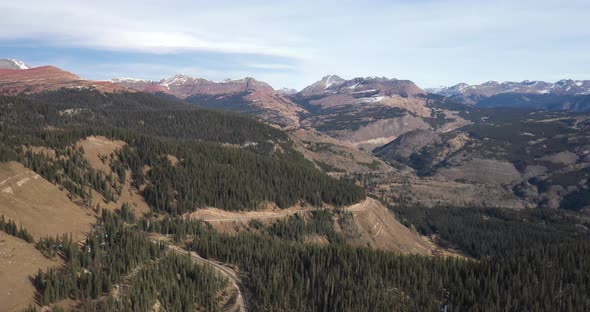 Rocky Mountains in Colorado with pine trees. Drone videoing down.