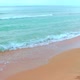 Sea Wave Rolls on the Sandy Shore on a Sunny Summer Day - VideoHive Item for Sale