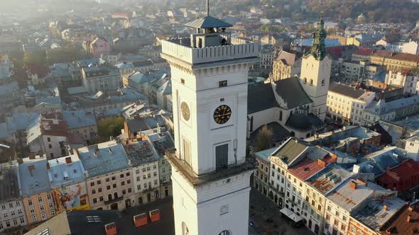 Aerial Drone Video of Lviv Old City Center - Roofs and Streets, City Hall Ratusha