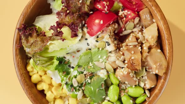 Poke Bowl Salad on Orange Background