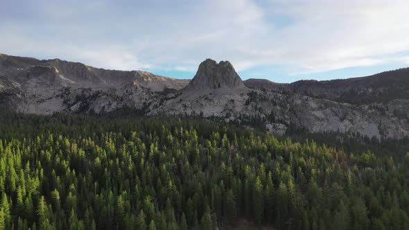 Aerial View Of Mammoth Lakes Forest And Mountains In California, USA. - pullback