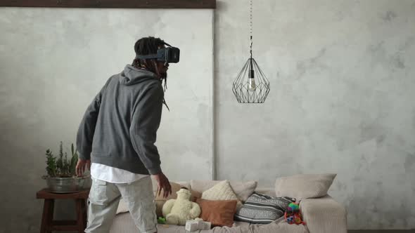 Playful Hipster Man Wearing Virtual Reality Device