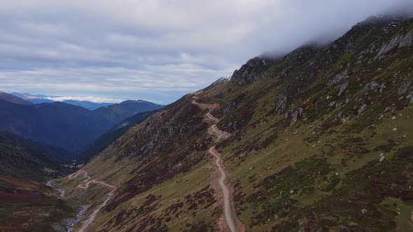 Curve of Serpentine Road in Mountain at Morning